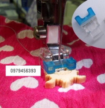 Chân vịt đơm cúc máy may gia đình