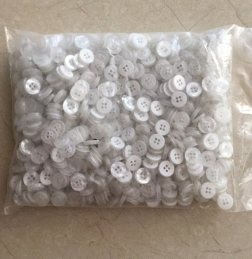 Cúc sơ mi Lacoste- gói 800 cái