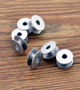 10 suốt chỉ nhôm máy may 1 kim > PHỤ LIỆU MAY- Trắng