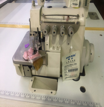 máy vắt sổ HIKARI