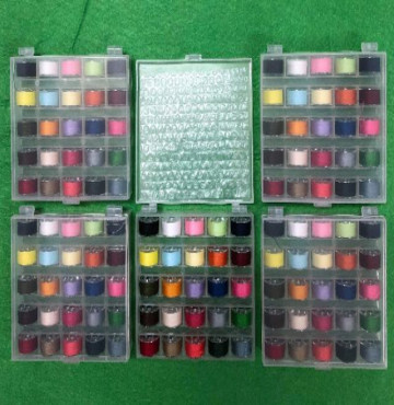 Hộp đựng 25 cái suốt nhựa cao 11mm có chỉ dùng cho máy gia đình đa chức năng, suốt chỉ có hộp