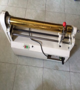 máy cắt nhủ (giấy ép kim)