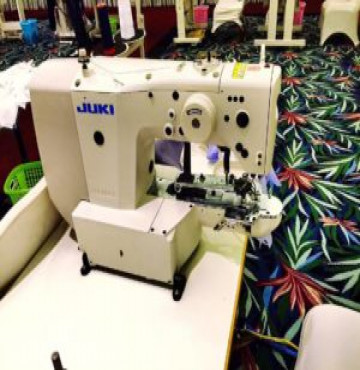 Máy đính nút điện tử