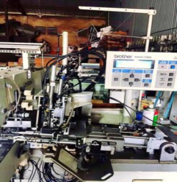 Máy đính đỉa quần tự động cũ