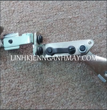 Cử chặn máy vắt sổ