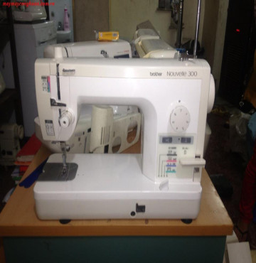 Bán công nghiệp Brother Nouvelle 300