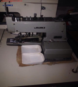 Máy đính cúc Juki