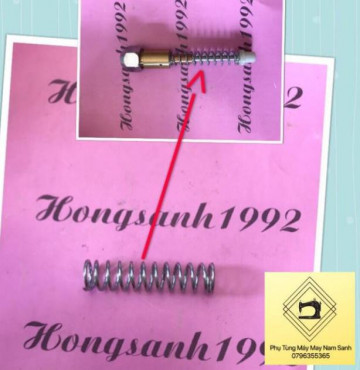 Lò xo lớn trong nòng súng bắn tẩy