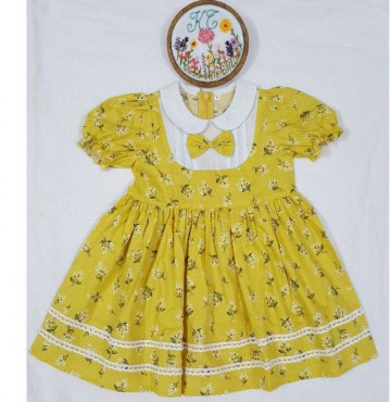 Đầm tồn kho bâu sen phối nơ cho bé