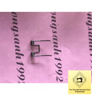 LÒ XO TRONG LƯỠI DAO MÁY HÚT CHỈ