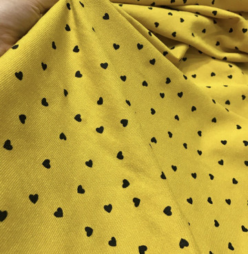 vải tăm chun tồn kho chấm tim