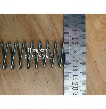 Lò xo thanh rây máy cắt đầu bàn