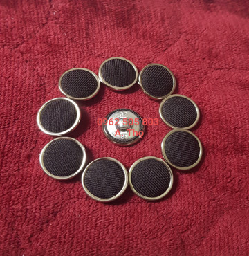 Nút bọc vải viền kim loại đồng