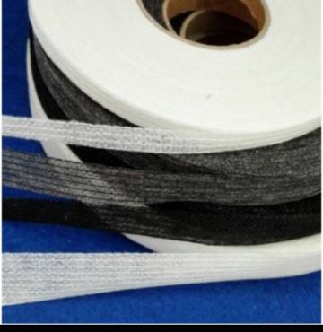 Dây mếch dán 2 mép vải chống bai đường may cuộn 45m. trắng giấy và ghi giấy cuộn 90m